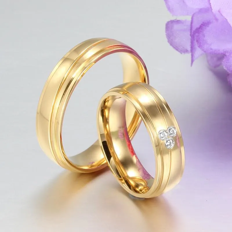 Gold Plated Stainless Steel with Tension Setting Cubic Zirconia Wedding Band