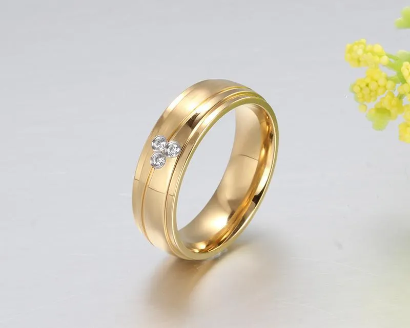 Gold Plated Stainless Steel with Tension Setting Cubic Zirconia Wedding Band