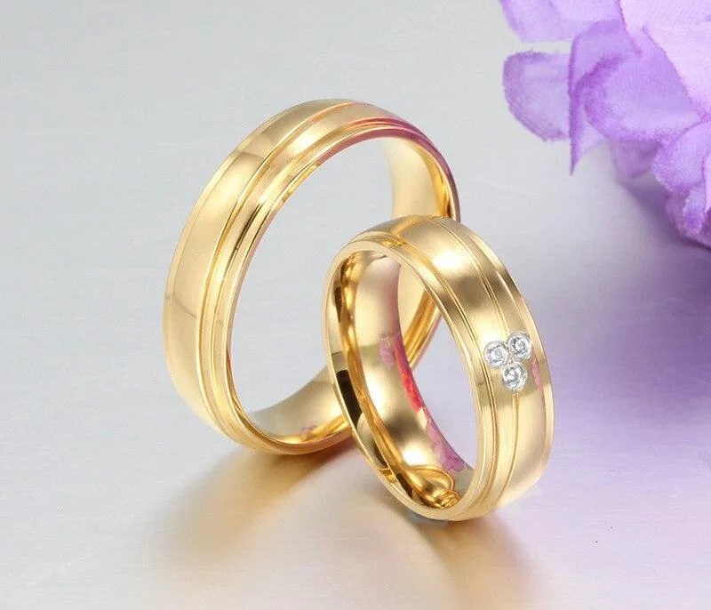 Gold Plated Stainless Steel with Tension Setting Cubic Zirconia Wedding Band