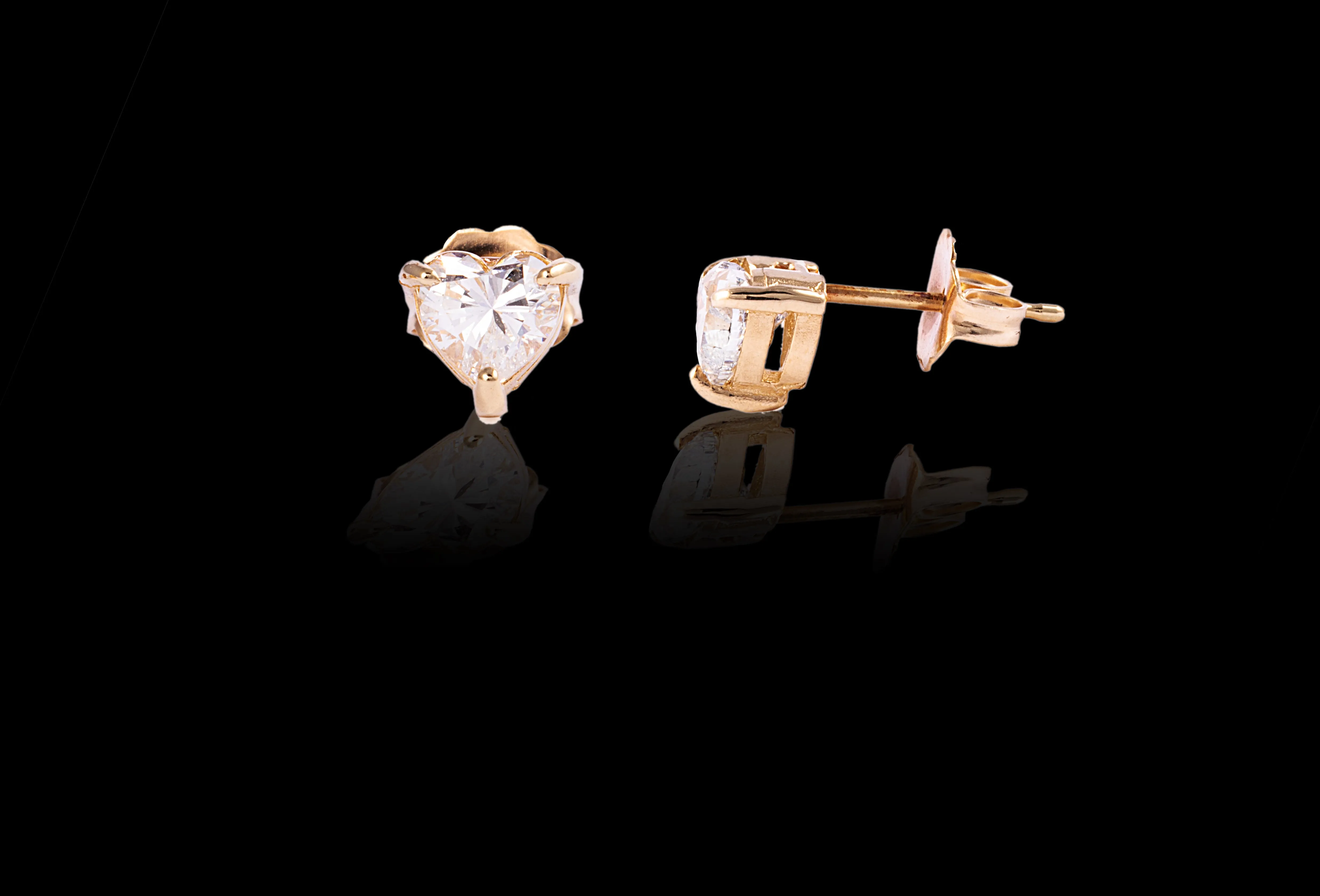 Heart Diamond stud earrings (pair or single)