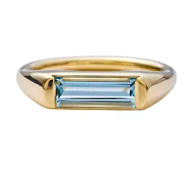 Modern Solitaire Ring with a Baguette Cut Aquamarine